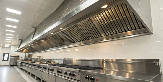 A stainless steel 10-foot commercial hood in a professional kitchen.