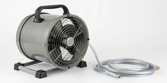 A portable exhaust fan with a flexible hose venting smoke and fumes from a room.
