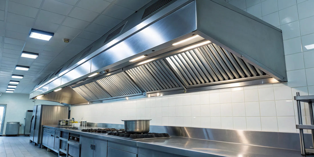 Commercial exhaust hood fan in a professional kitchen.