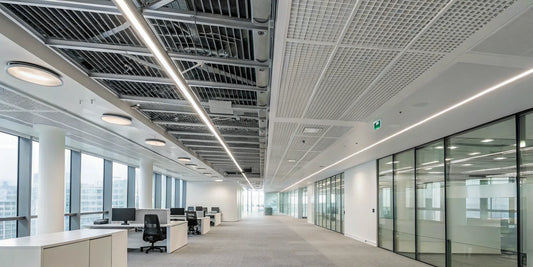 Exposed commercial ventilation system in a modern office.